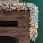 Glitzhome 9 ft. Pre-Lit Snow Flocked Artificial Christmas Garland with Warm White LED Lights and Pine Cones thumbnail 4