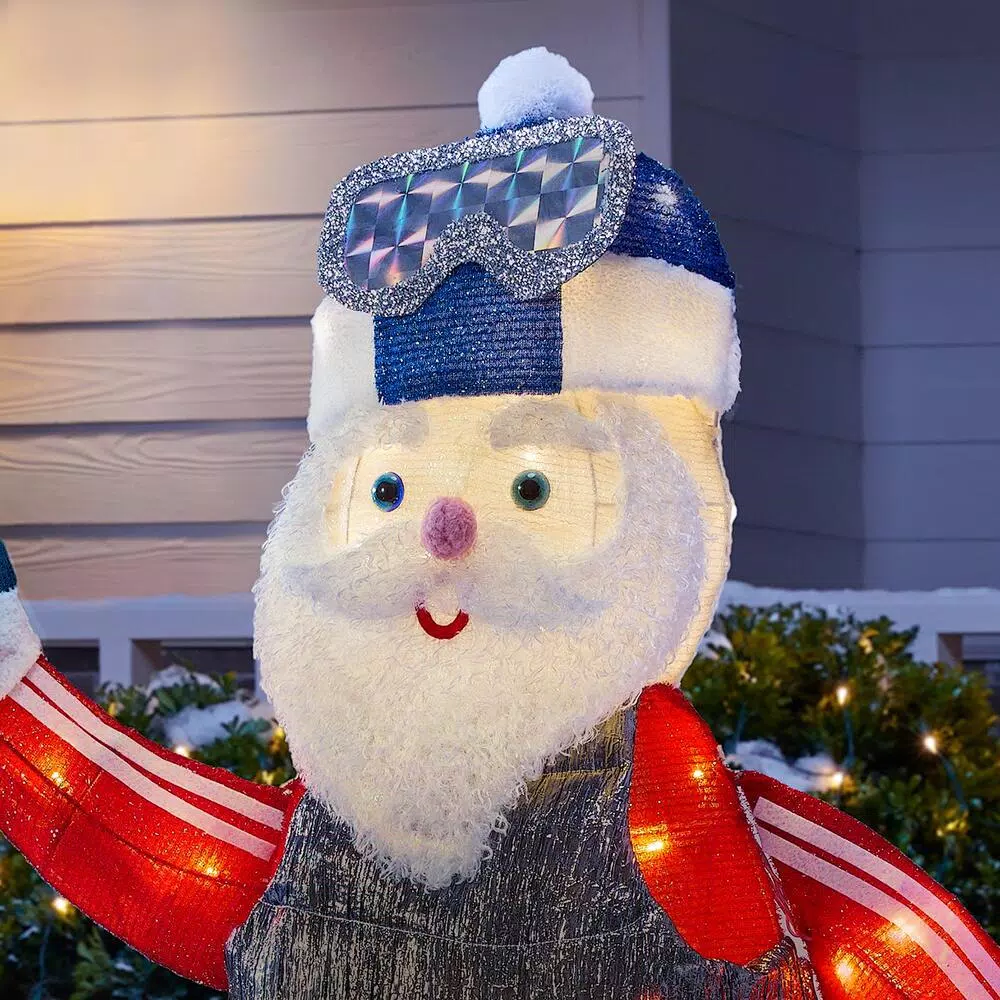Home Accents Holiday Yuletide Lane 4 ft. LED Santa with Snowboard Yard Decoration