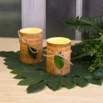 LUMABASE 4 in. Cork Wrapped Flameless LED Pillar Candles with Leaf and Jute Bow (Set of 2) thumbnail 3