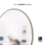 Umbra Hubba 34-inch Round Contemporary Brass Wall Mirror thumbnail 5