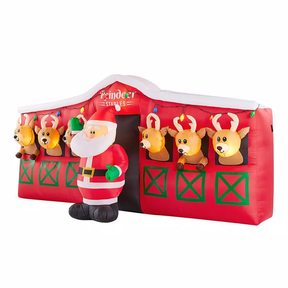 Home Accents Holiday 9 ft LED Inflatable Santa's Stable with Reindeer Holiday Decor