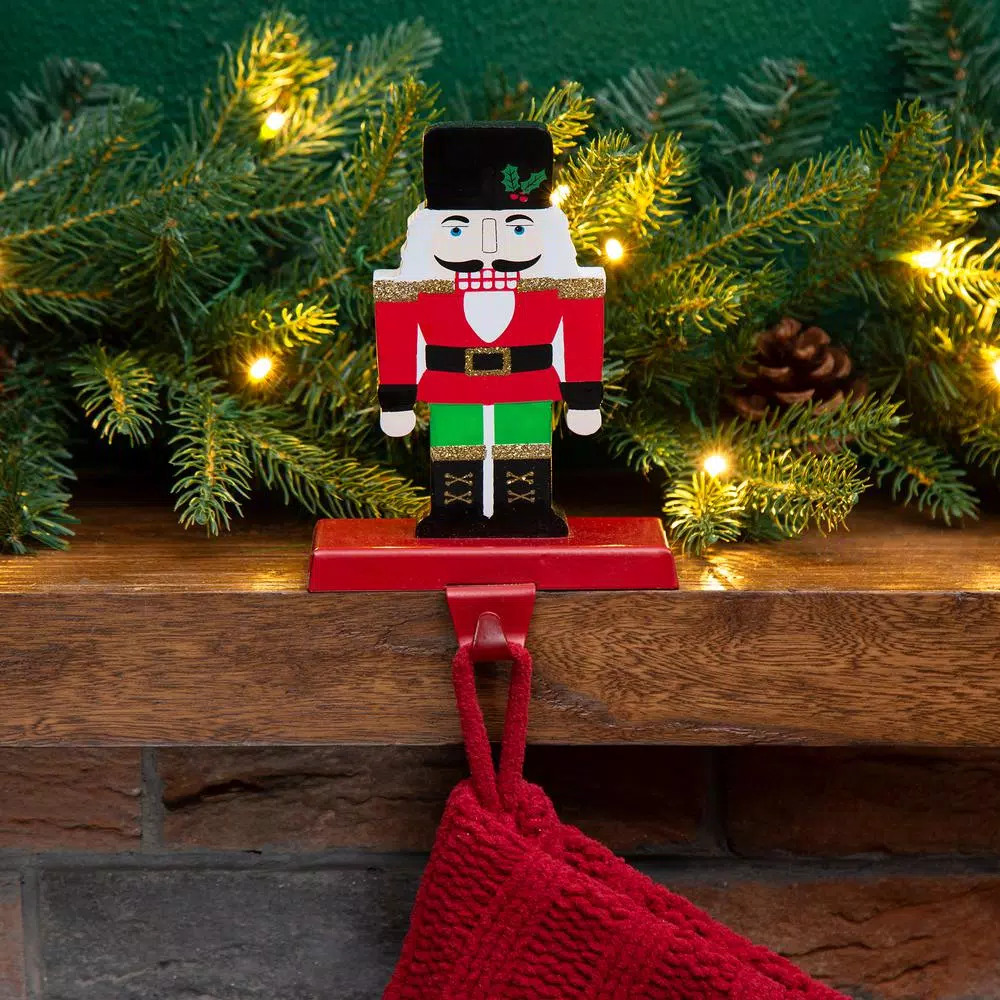 Glitzhome 7 in. Nutcracker Wooden and Metal Stocking Holder, Festive Holiday Decor