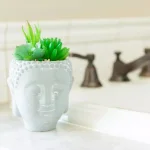 Flora Bunda 8 in. Faux Succulent Mix in Cement Buddha Planter thumbnail 5