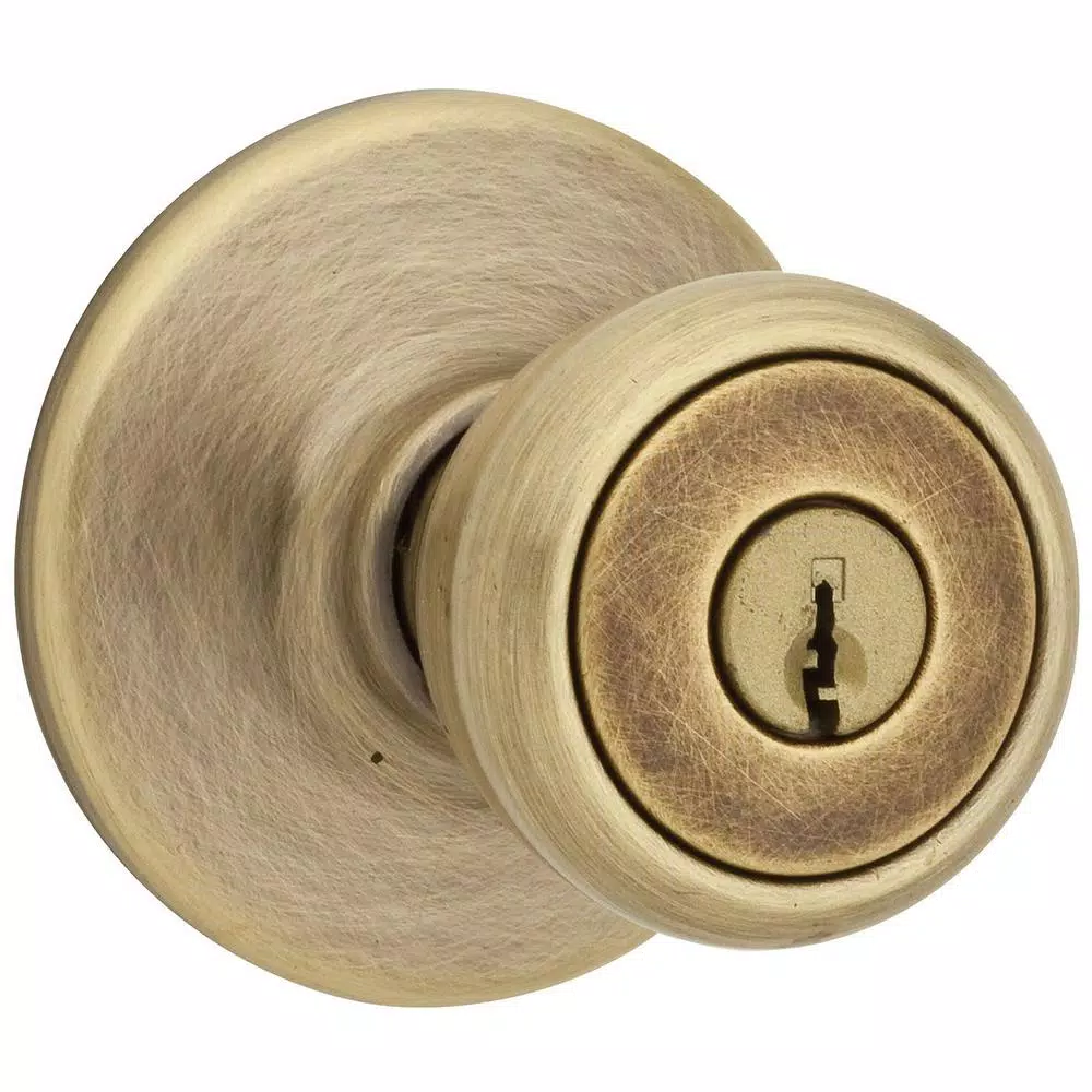 Kwikset Tylo Antique Brass Exterior Entry Door Knob with Microban Antimicrobial Technology