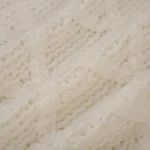Glitzhome 52 in. White Knitted Chenille Christmas Tree Skirt with Red Trim and Pompoms thumbnail 5