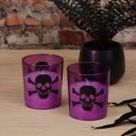 LUMABASE Skull and Crossbones Purple Glass LED Battery Operated Candles, Set of 2 thumbnail 2