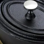 Gibson Home Campton 0.35 qt. Oval Cast Iron Mini Casserole Dish with Lid and Wood Base, Black thumbnail 3
