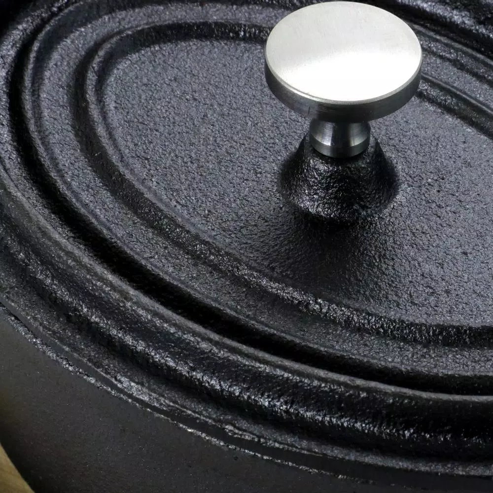Gibson Home Campton 0.35 qt. Oval Cast Iron Mini Casserole Dish with Lid and Wood Base, Black