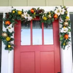 Village Lighting Company 9 ft. Pre-Lit LED Magnolia Orchard Artificial Christmas Garland with Warm White Lights thumbnail 6