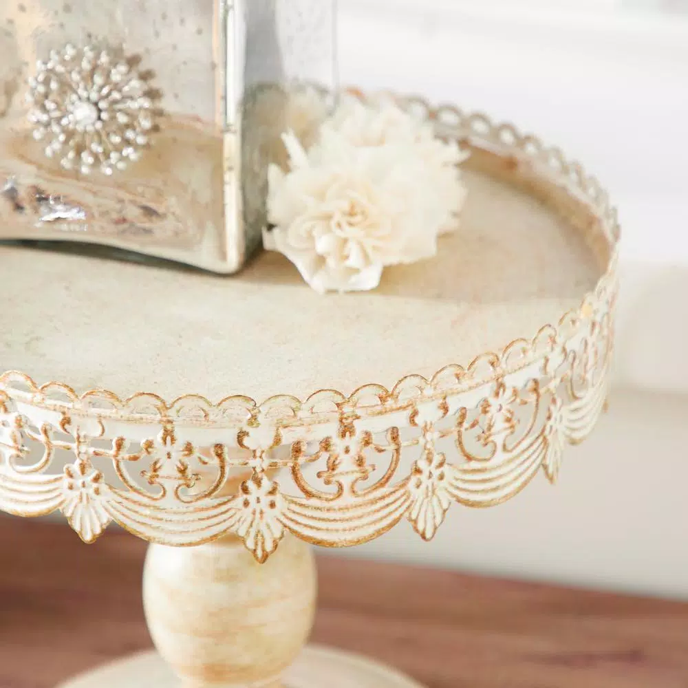 LITTON LANE 10 in. Round Whitewashed and Rust Brown Iron Cake Stand with Pierced Floral Bunting