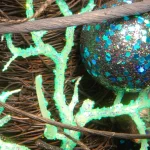 National Tree Company 23 in. Potted Halloween Tree with Sequined Leaves and Spiders thumbnail 4
