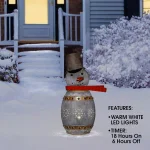 Alpine Corporation 30 in. Weathered Metal Barrel Snowman Sculpture with Warm White LED Lights thumbnail 4