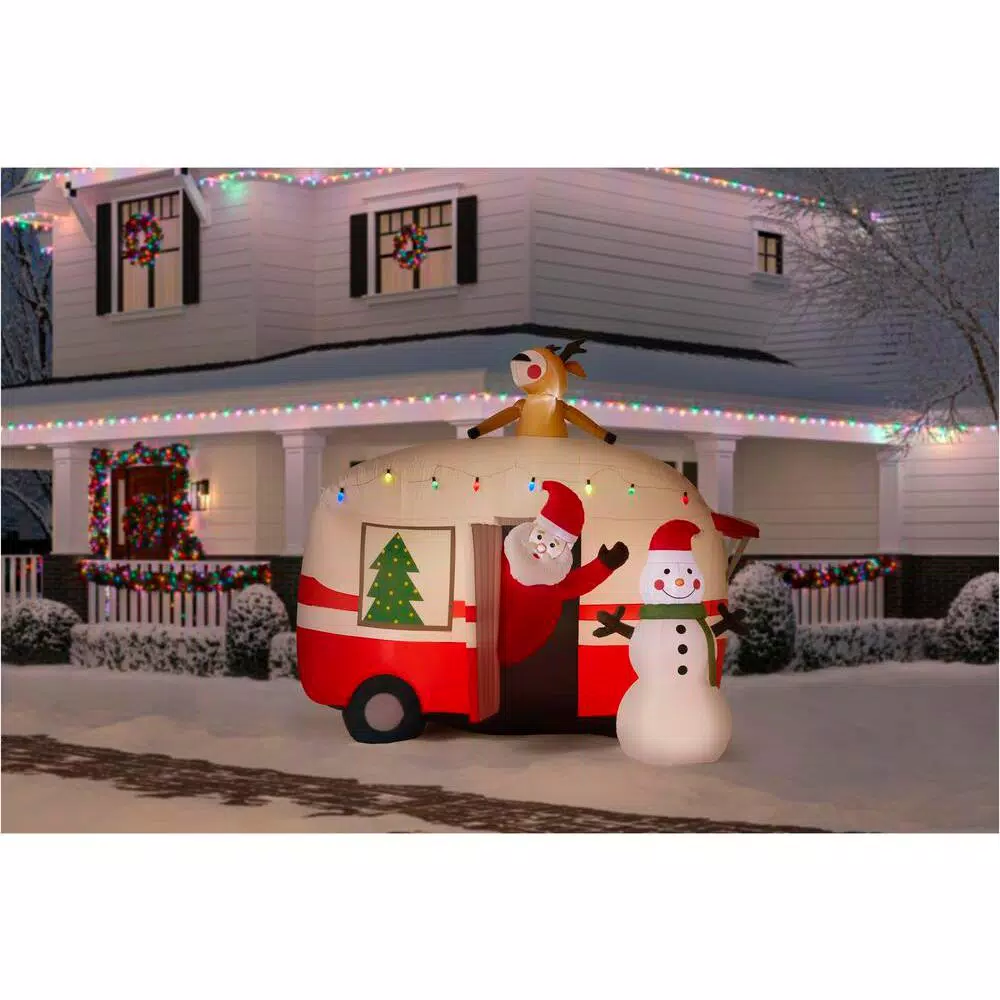 Unbranded 7 ft. Pre-Lit Inflatable Jolly Holiday Camper with Santa, Snowman, and Reindeer