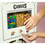 Nostalgia 600W 8 oz. Ivory Popcorn Machine with Cart and Candy Dispenser thumbnail 3