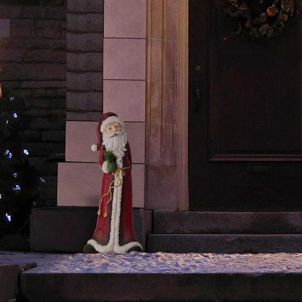 Alpine Corporation Alpine 28 in. Tall Skinny Santa Claus Sculpture - Indoor/Outdoor Christmas Decor