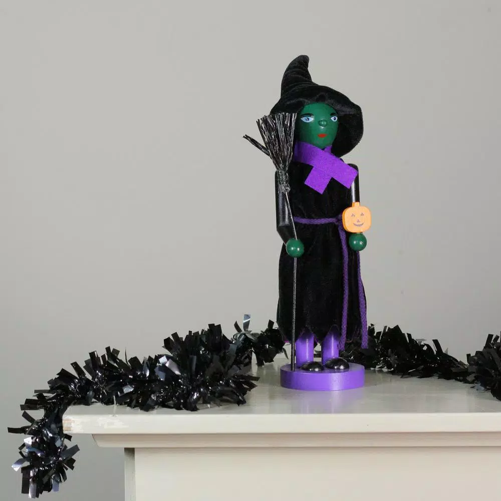 Northlight 14 in. Green Witch Wooden Halloween Nutcracker with Broom and Jack-O-Lantern