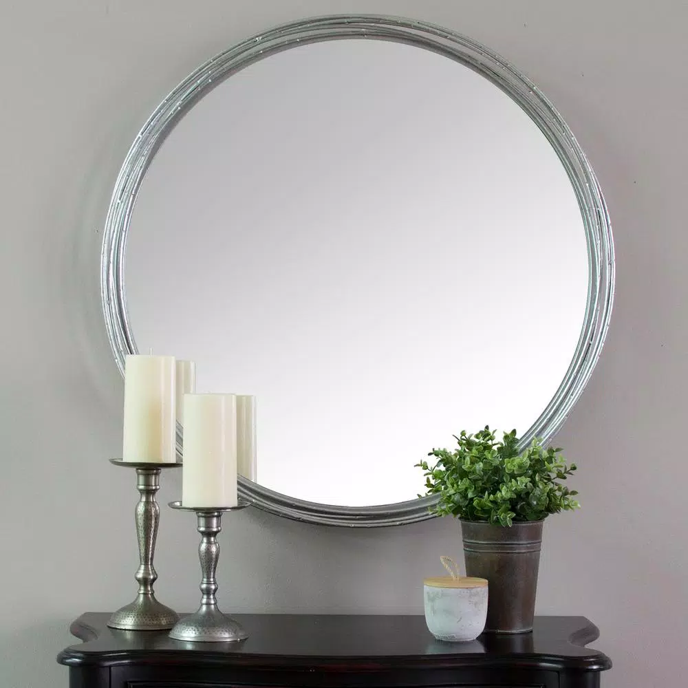 Stratton Home Decor Jocelyn Round Silver Metal Accent Mirror, 29.5 in.