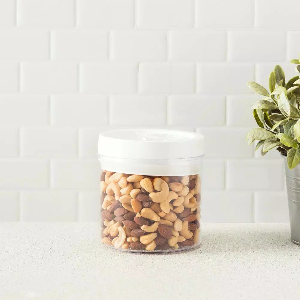 Home Basics 0.9 L Twist 'N Lock Air-Tight White Round Plastic Canister