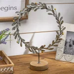 Unbranded 14.5 in. Metal Star Wreath with Golden Berries on Wooden Stand thumbnail 2