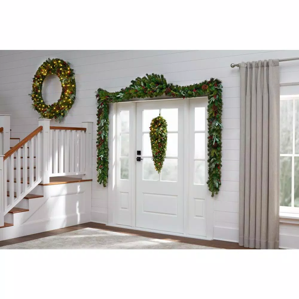 Home Accents Holiday Woodmoore 17 ft. Artificial Christmas Garland with Poinsettias, Berries, and Pinecones