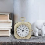 Stonebriar Collection Weathered White Metal Tabletop Analog Clock with Roman Numerals thumbnail 1