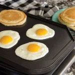 Nordic Ware Cast Aluminum 2-Burner Reversible Griddle, Nonstick Stovetop and Outdoor Grill Pan thumbnail 2