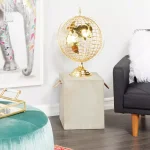 LITTON LANE 25 in. Gold Metal Spinning Decorative Globe with Hammered Topographical Design thumbnail 1