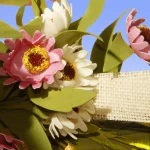 National Tree Company 22 in. White and Pink Sunflower Wreath with Burlap Bows thumbnail 2