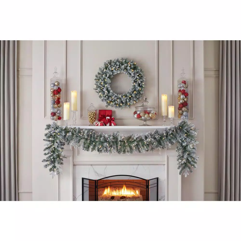 Home Accents Holiday 9 ft. Pre-Lit Flocked Frasier Fir LED Garland with Timer