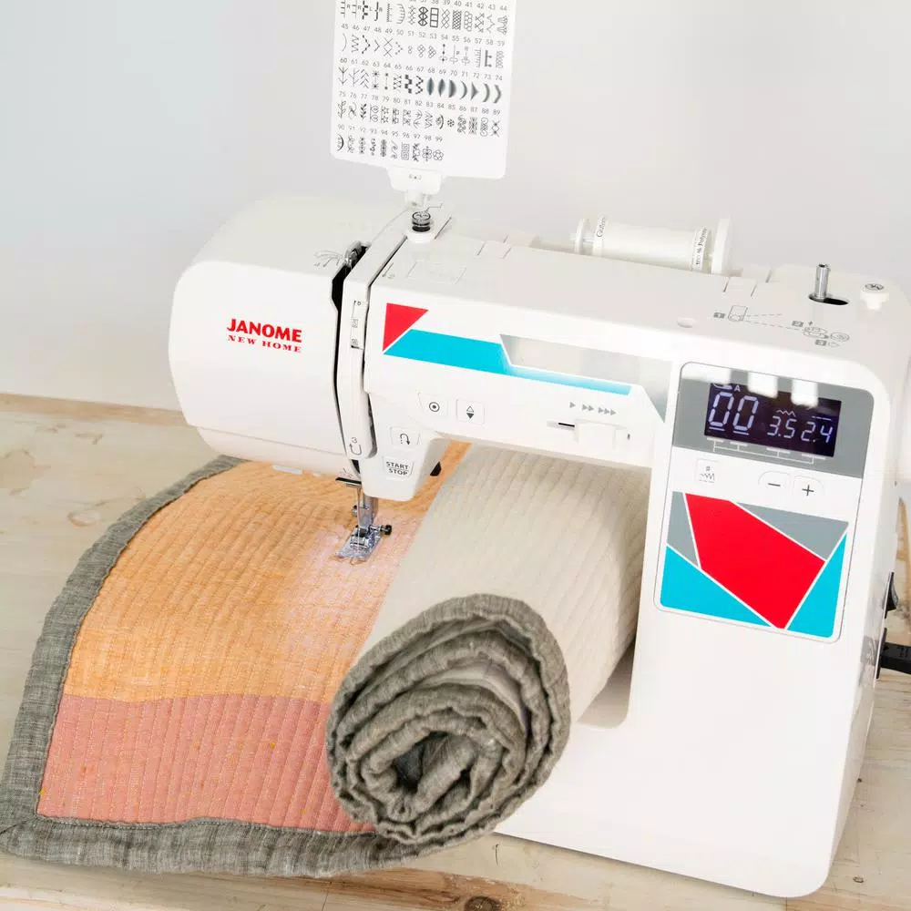 Janome MOD-100Q Computerized Quilting and Sewing Machine with Bonus Accessories
