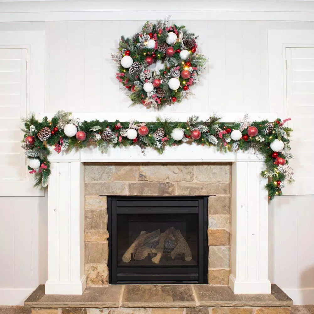 Village Lighting Company 9 ft. Frosted Wonderland Pre-Lit LED Christmas Garland, Red and White Candycane Theme
