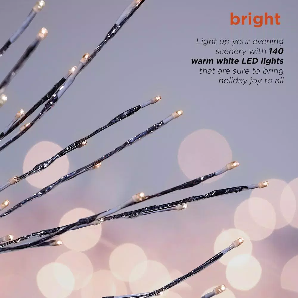 Alpine Corporation 39 in. Silver Metallic Foil Tree Stake with 140 Warm White LED Lights