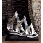 LITTON LANE 9 in. Stylized Sailboat Decorative Sculpture - Polished Silver Aluminum on Black Wood Base thumbnail 7