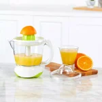 Continental Electric 40W Electric Citrus Juicer, 24 oz. White/Green Juicer with Dust Cover and Easy Pour Spout thumbnail 6