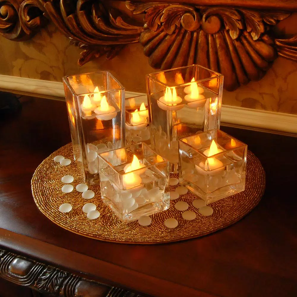 LUMABASE Amber Floating LED Tea Light Candles, Waterproof Battery Operated, 1.25 x 1.25 in, 12-Count