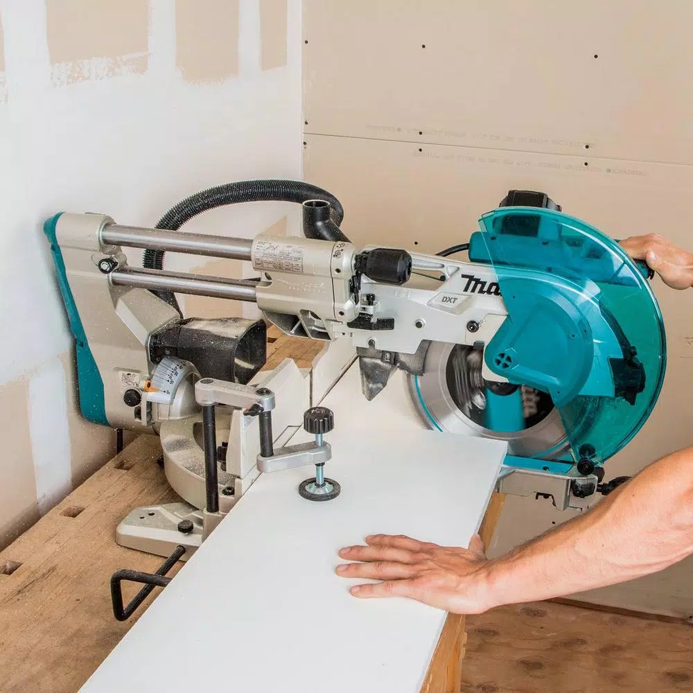 Makita 12 in. Dual-Bevel Sliding Compound Miter Saw with Laser and WST06 Folding Stand Bundle