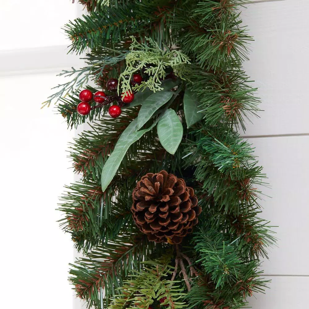Home Accents Holiday Woodmoore 17 ft. Artificial Christmas Garland with Poinsettias, Berries, and Pinecones
