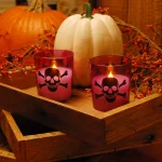 LUMABASE Skull and Crossbones Purple Glass LED Battery Operated Candles, Set of 2 thumbnail 3