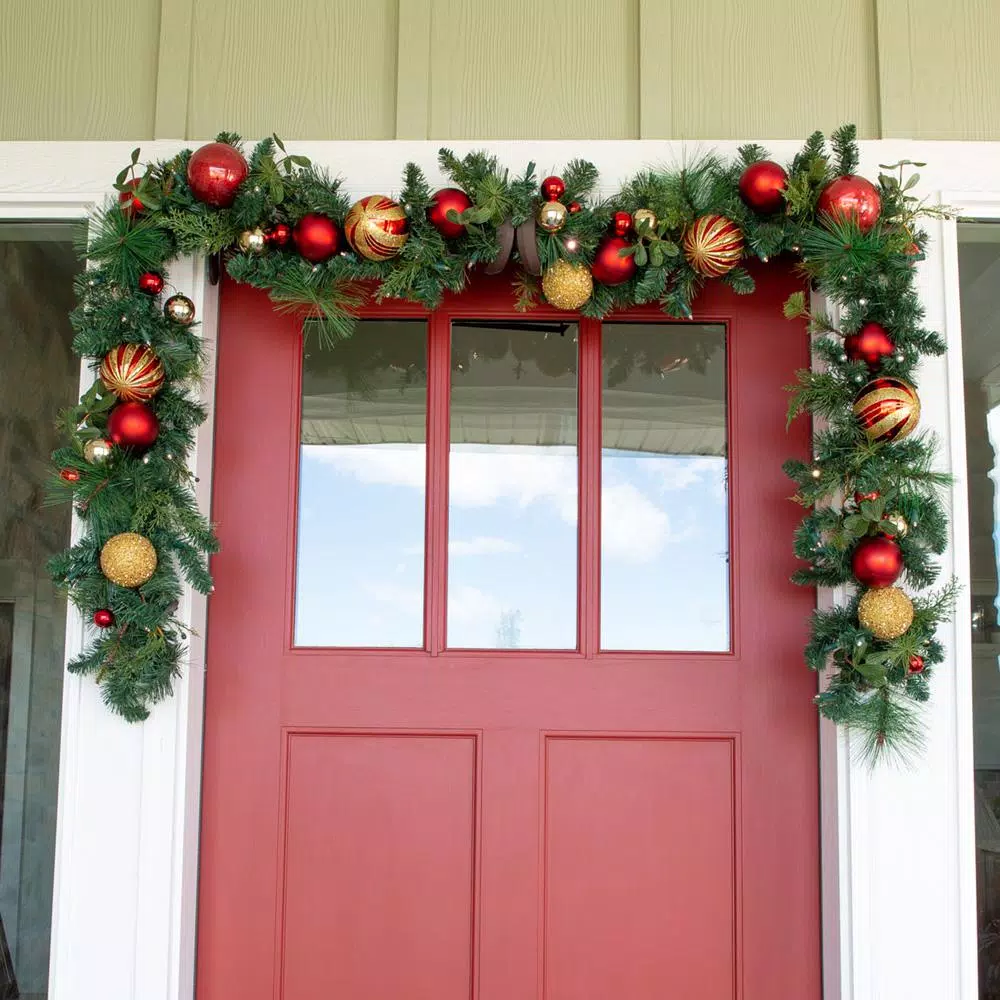 Village Lighting Company 9 ft. Pre-Lit LED Christmas Classic Garland with Red and Gold Ornaments