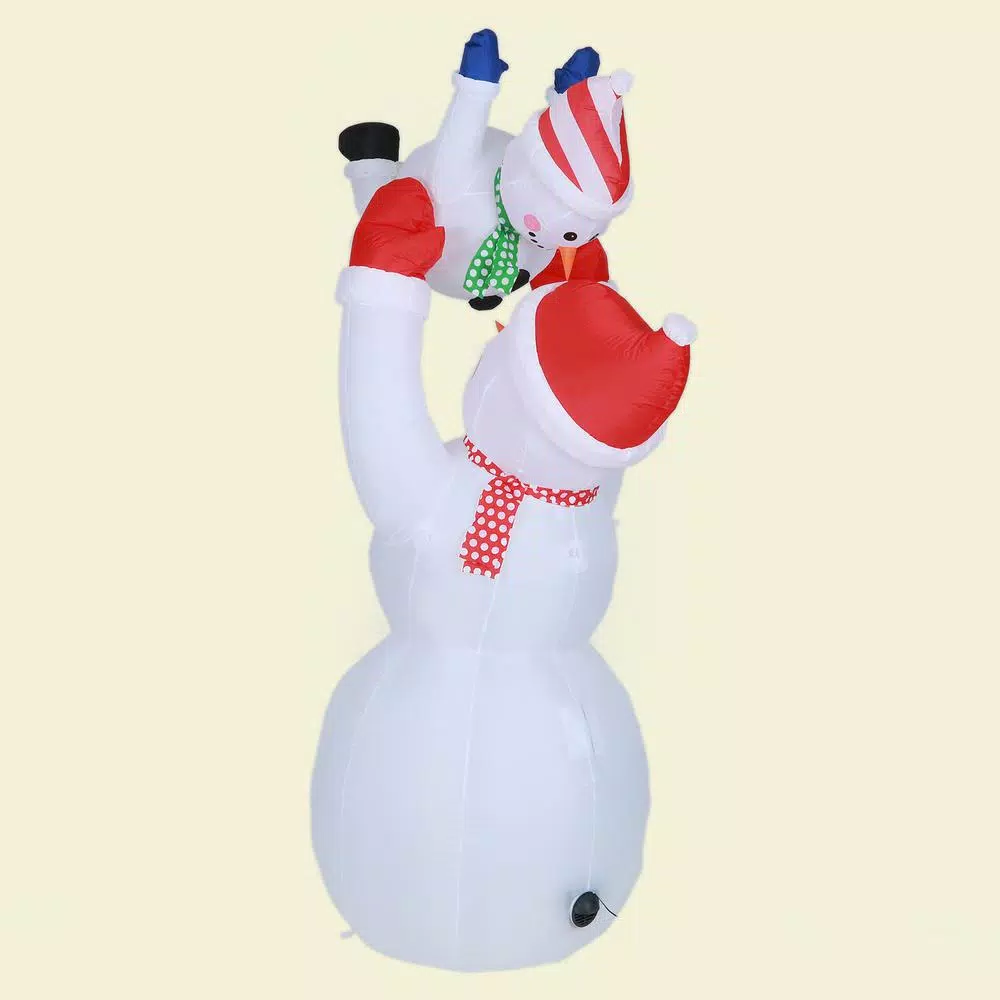 Luxen Home 8 ft. Snowman Family Playing Inflatable Holiday Yard Decor with LED Lights