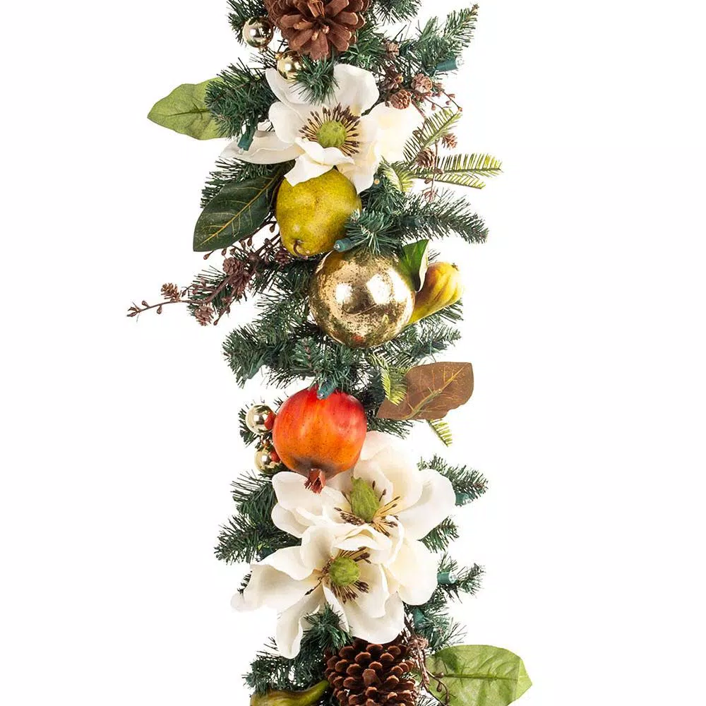 Village Lighting Company 9 ft. Pre-Lit LED Magnolia Orchard Artificial Christmas Garland with Warm White Lights