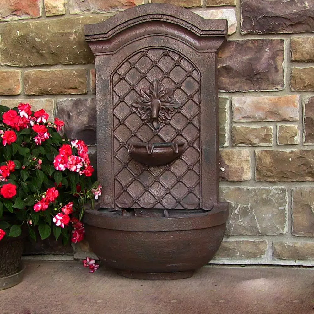 Sunnydaze Decor Rosette Resin Weathered Iron Solar Outdoor Wall Fountain with Battery Backup