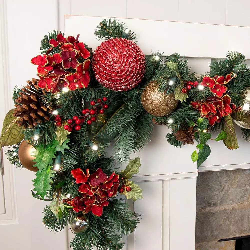Village Lighting Company 9 ft. Pre-Lit LED Scarlet Hydrangea Artificial Garland with Warm White Lights