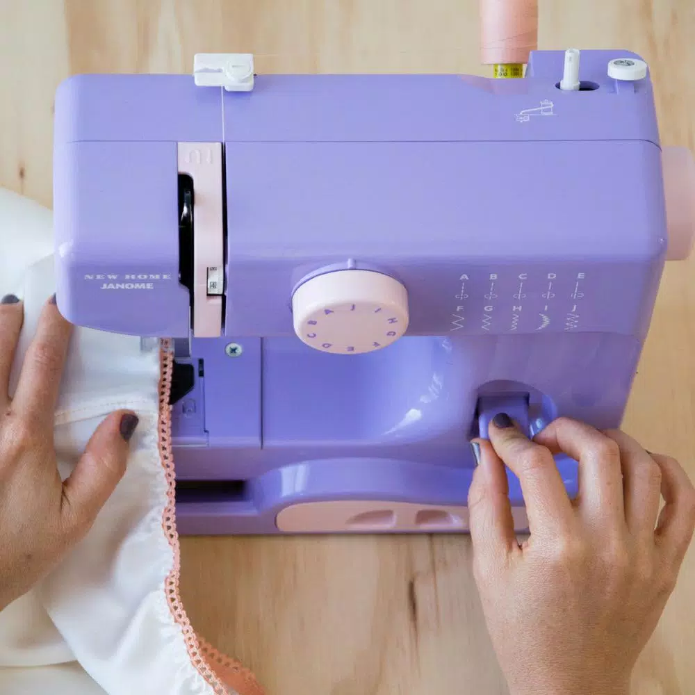 Janome Lady Compact Sewing Machine - 10 Stitch Options, 5 lbs Portable Design