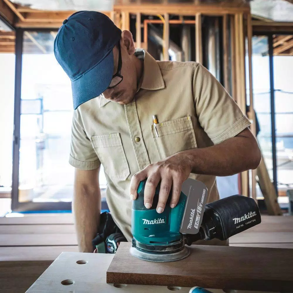 Makita 18V LXT 4.0 Ah Battery and Rapid Optimum Charger Starter Pack with Bonus 5 in. Random Orbit Sander