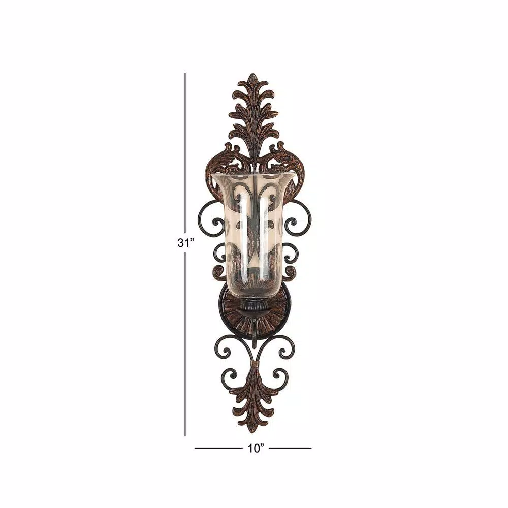 LITTON LANE Antique Gold Flourished Iron Candle Sconce with Clear Glass Hurricane Shade