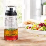 HOUSEHOLD ESSENTIALS Leifheit Glass Salad Dressing Shaker with Lid and Measurement Markings, 10.1 oz thumbnail 1