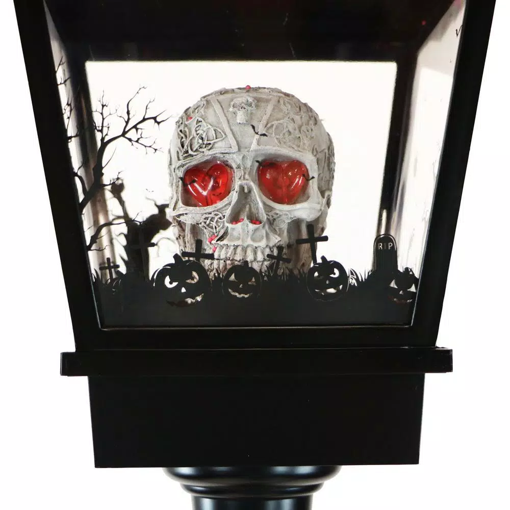 Haunted Hill Farm 71 in. Black Animated Skull Lamp Post with Spooky Music