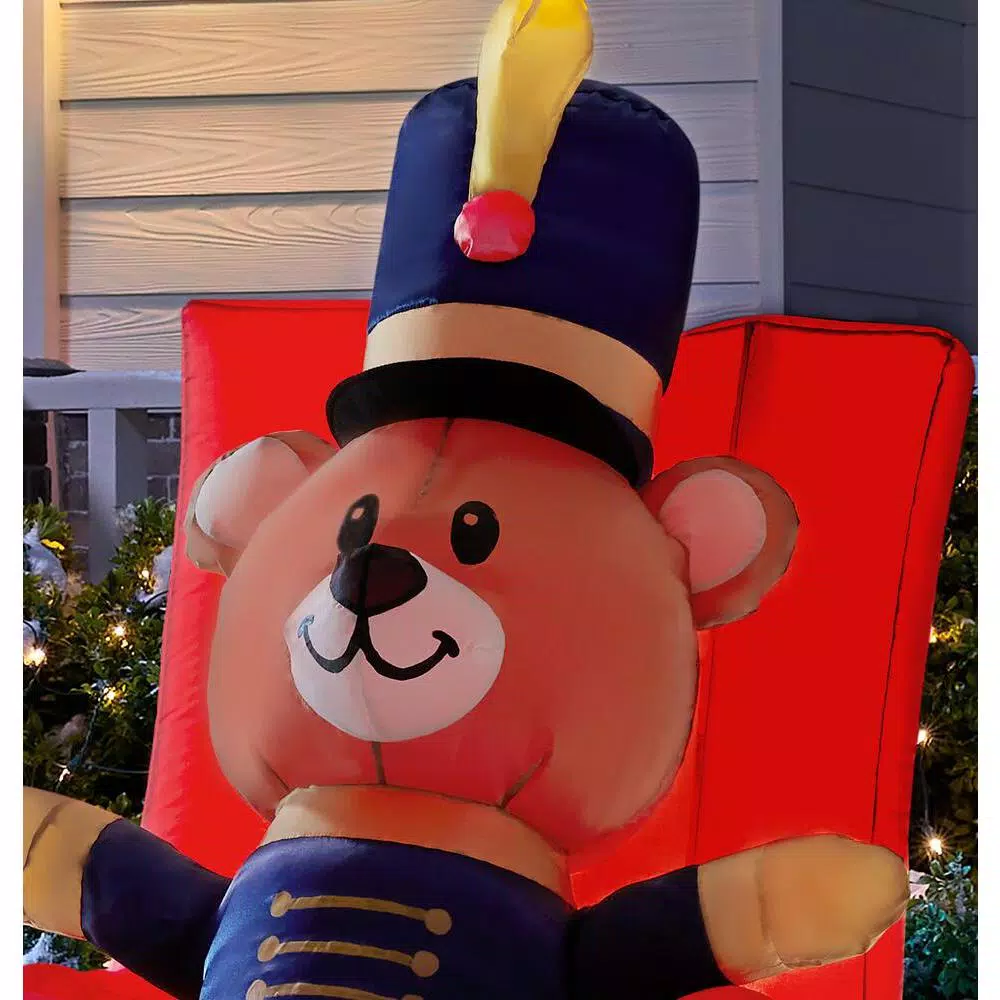 Home Accents Holiday 5 ft. Animated Airblown Inflatable Drum Major Bear in Jack-in-the-Box Christmas Decoration