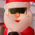 Unbranded 6 ft. Pre-Lit Inflatable Santa Driving Snowmobile Holiday Decoration thumbnail 4